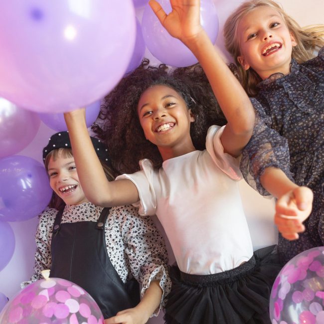 portrait-young-girls-party-with-balloons